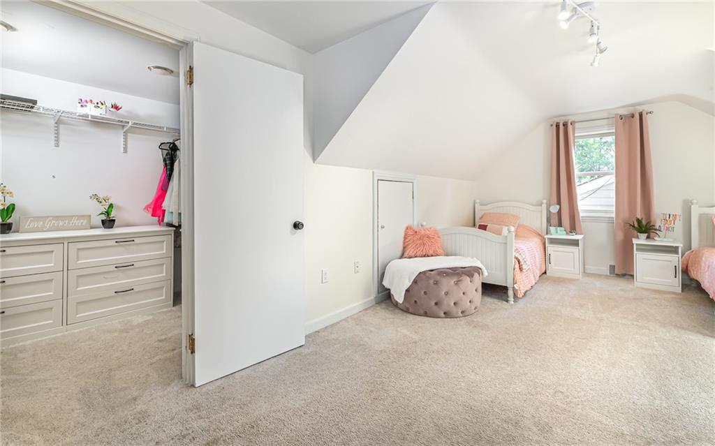 511 Chestnut Road Sewickley, PA 15143 - Photo 15 of 25 a bedroom with a bed and a cabinets