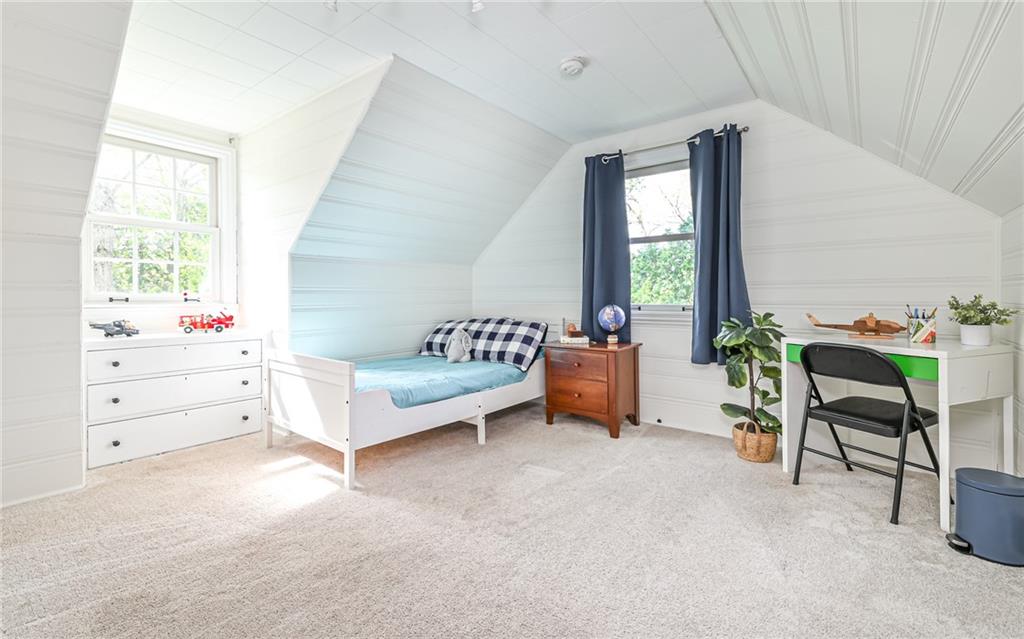 511 Chestnut Road Sewickley, PA 15143 - Photo 16 of 25 a bed room with a bed and a chair