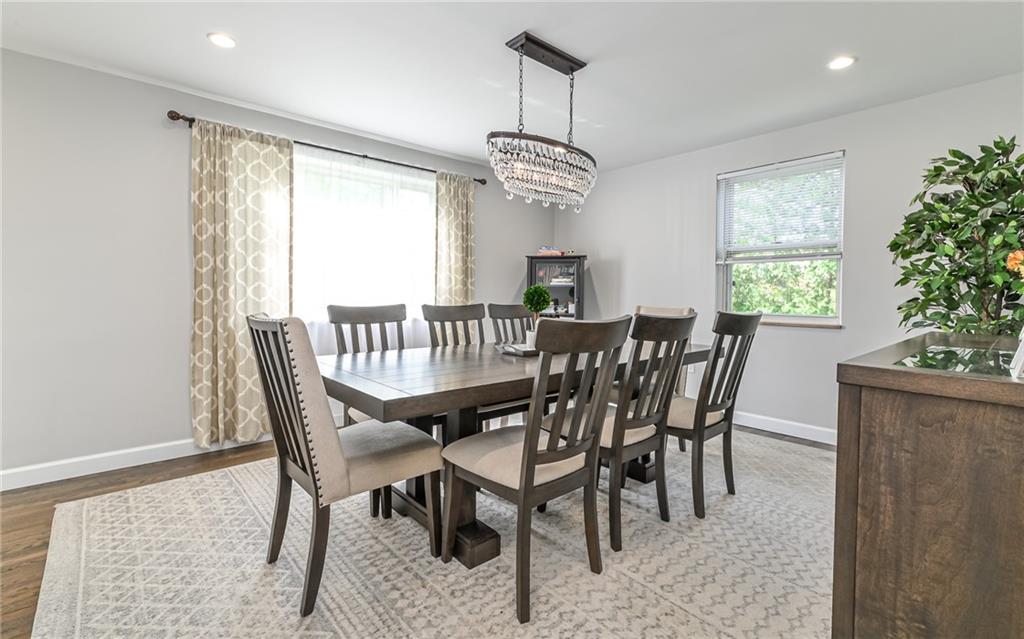 511 Chestnut Road Sewickley, PA 15143 - Photo 9 of 25 a view of a dining room with furniture window and wooden floor