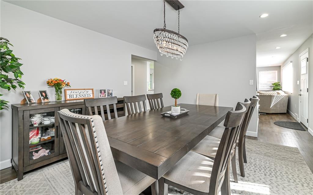 511 Chestnut Road Sewickley, PA 15143 - Photo 10 of 25 a view of a dining room with furniture wooden floor and chandelier