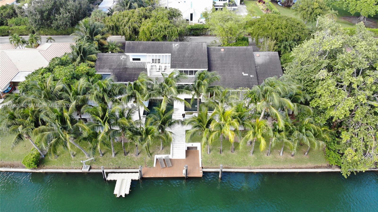 700 Lake Road Miami, FL 33137 - Photo 1 of 10 an aerial view of a house with a yard