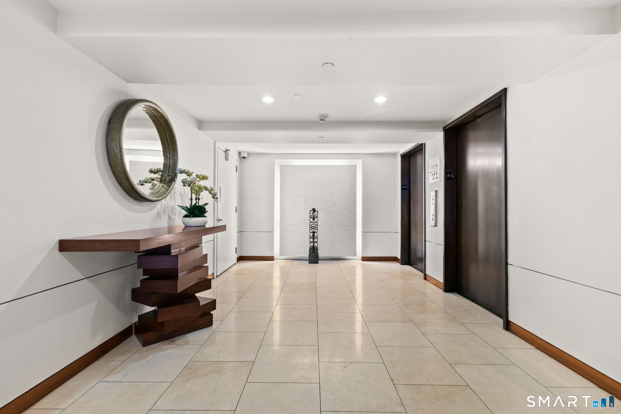 25 Forest Street, Unit 7D Stamford, CT 06901 - Photo 3 of 33 a living room with furniture