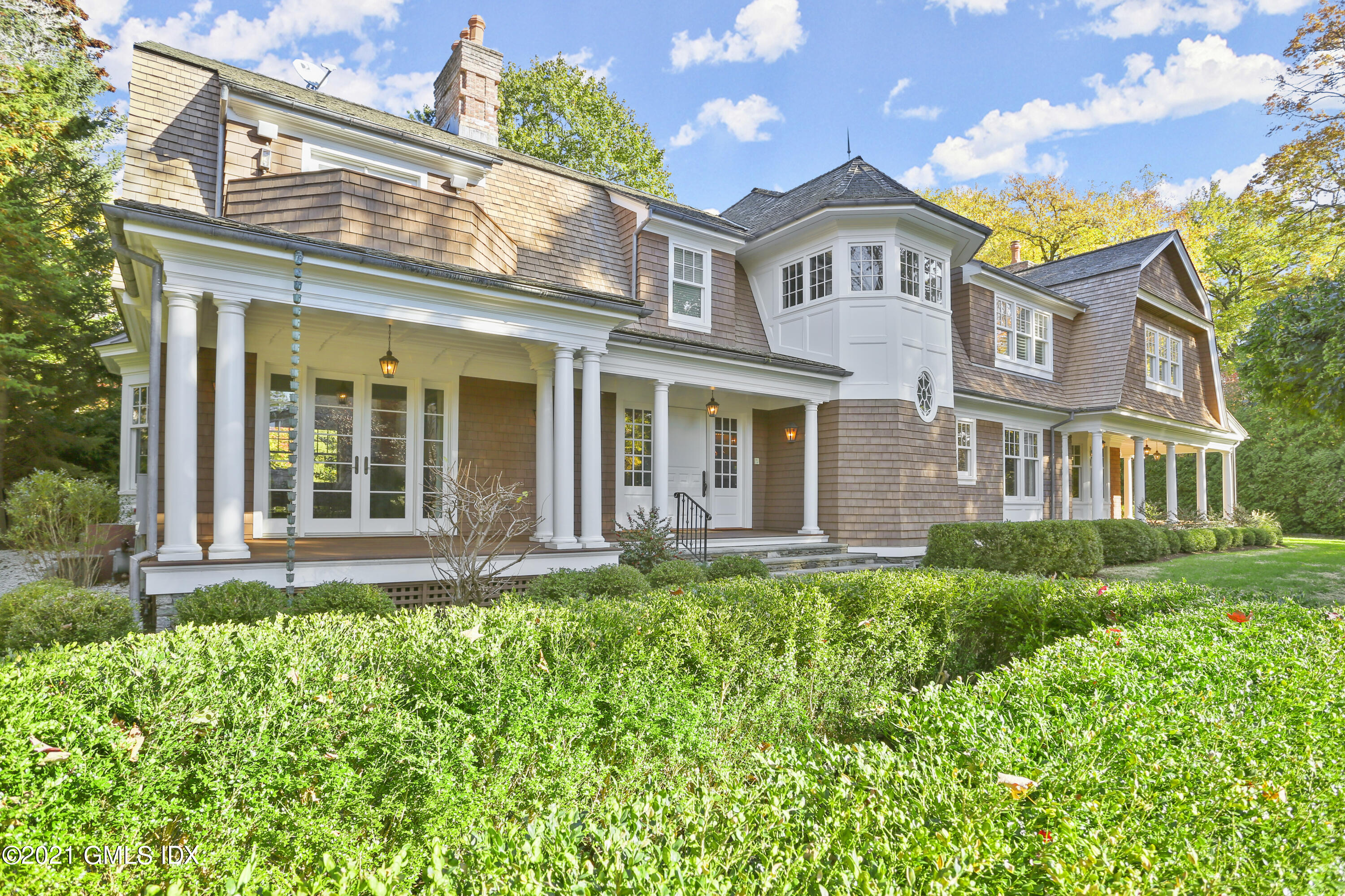 222 Riverside Avenue Riverside, CT 06878 - Photo 1 of 61 front view of a house with a yard