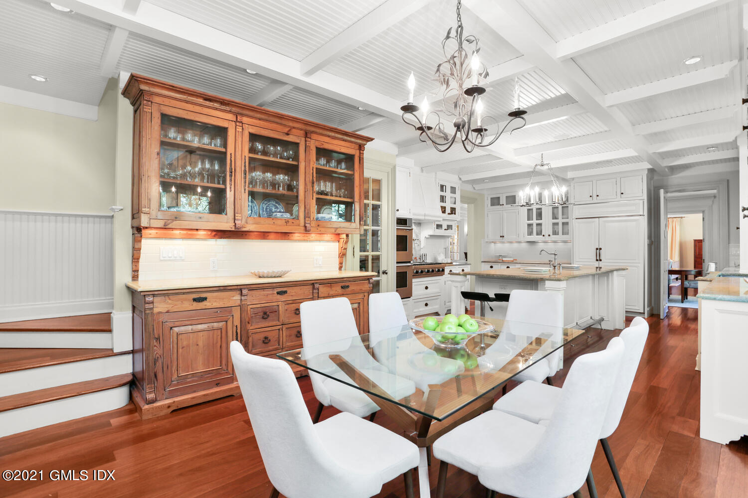 222 Riverside Avenue Riverside, CT 06878 - Photo 22 of 61 a view of a dining room with furniture a chandelier and wooden floor