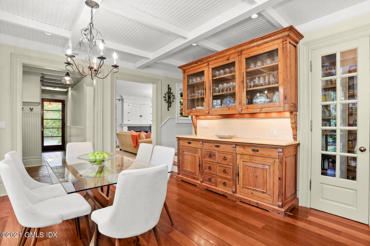 222 Riverside Avenue Riverside, CT 06878 - Photo 23 of 61 a view of a dining room with furniture a chandelier and wooden floor