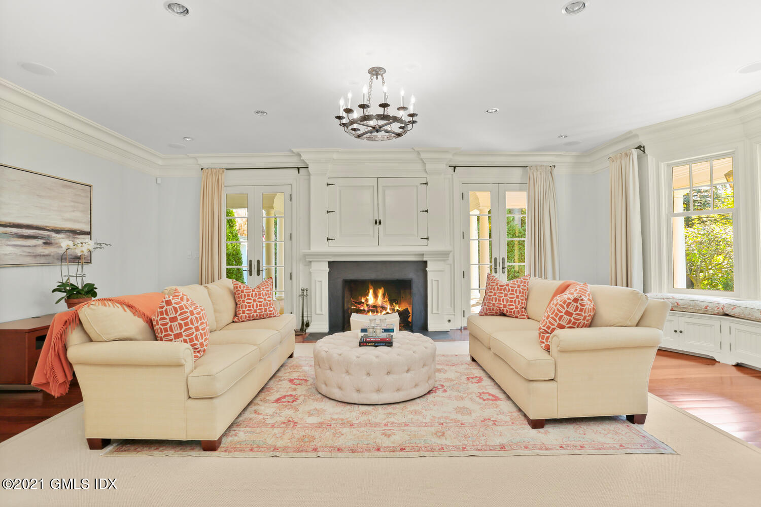 222 Riverside Avenue Riverside, CT 06878 - Photo 25 of 61 a living room with furniture and a fireplace