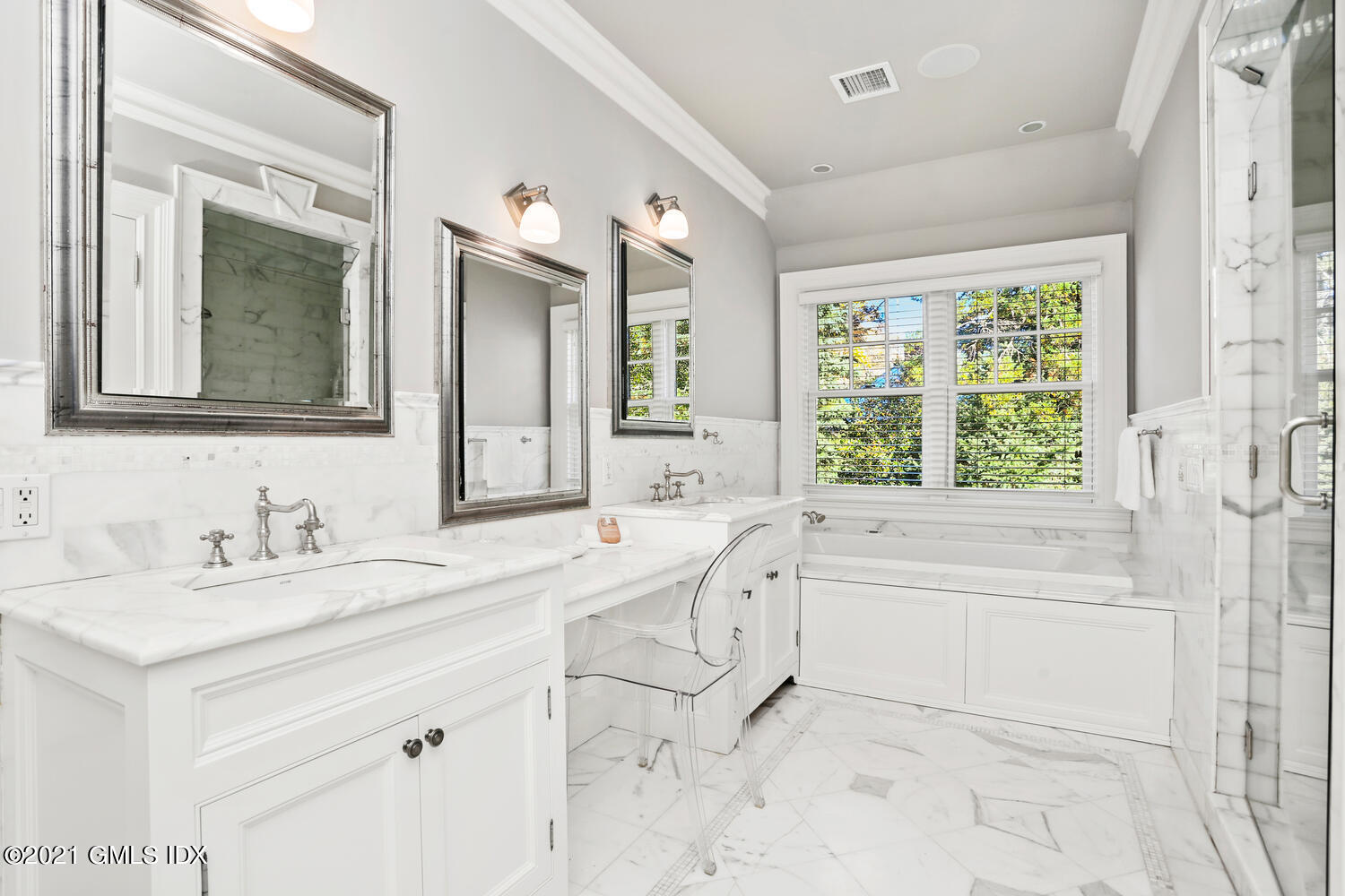 222 Riverside Avenue Riverside, CT 06878 - Photo 34 of 61 a bathroom with a sink vanity tub and a mirror