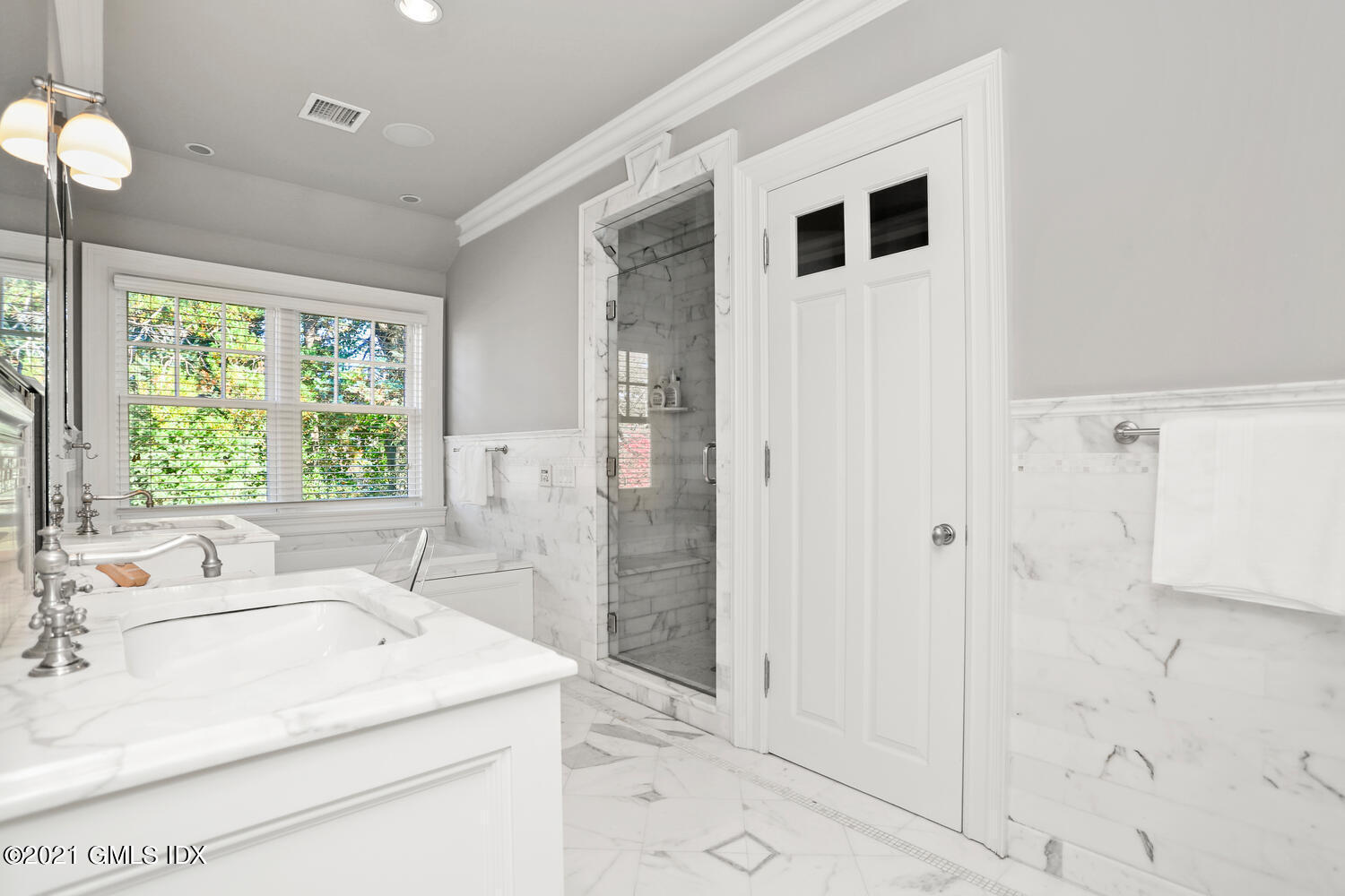 222 Riverside Avenue Riverside, CT 06878 - Photo 35 of 61 a bathroom with a sink a toilet and shower