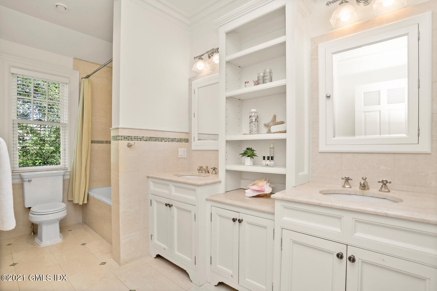222 Riverside Avenue Riverside, CT 06878 - Photo 38 of 61 a bathroom with a sink and a toilet