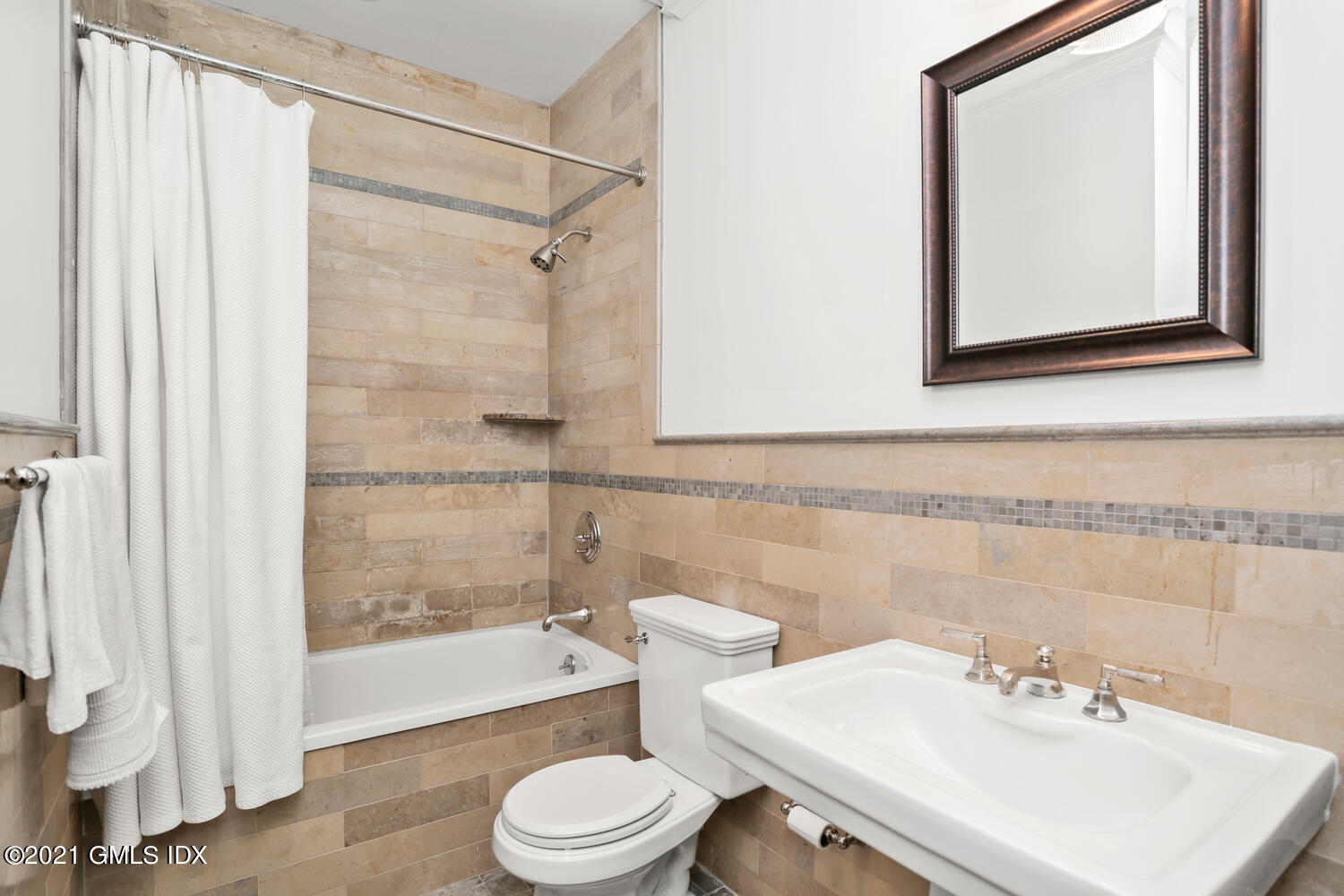 222 Riverside Avenue Riverside, CT 06878 - Photo 42 of 61 a bathroom with a sink mirror toilet and bathtub