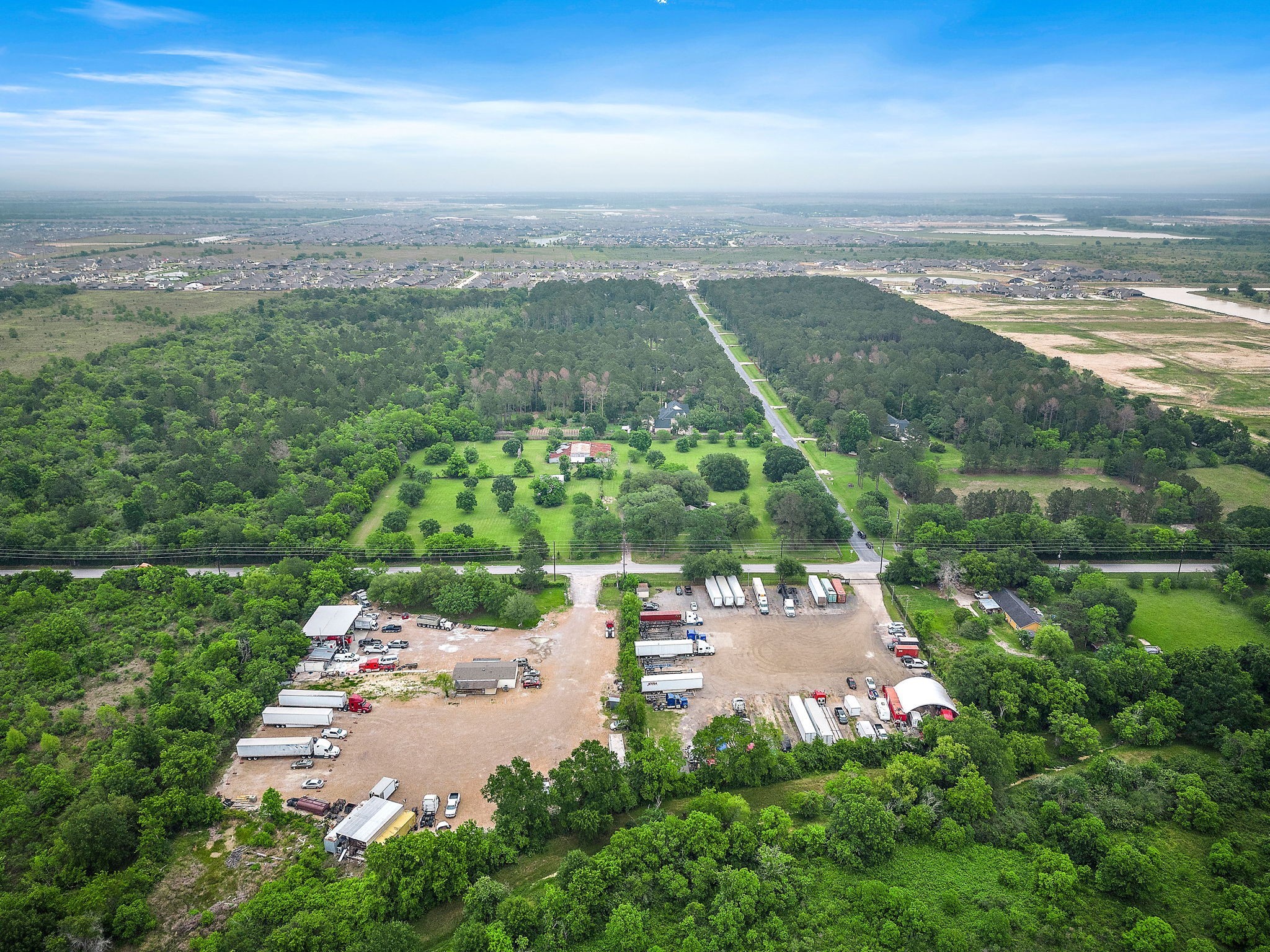 6403 Katy Hockley Cut Off Road Katy, TX 77493 - Photo 4 of 6 an aerial view of a house with a garden