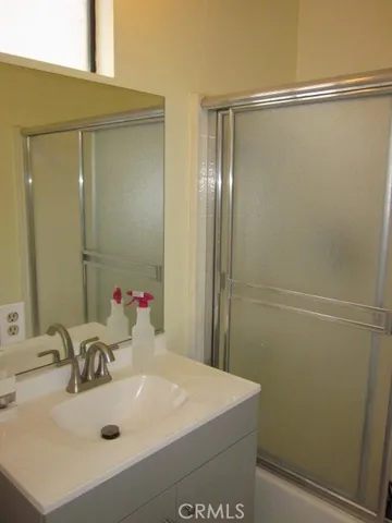 a view of a porch with furniture and a rug