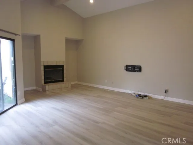 a view of a livingroom with wooden floor
