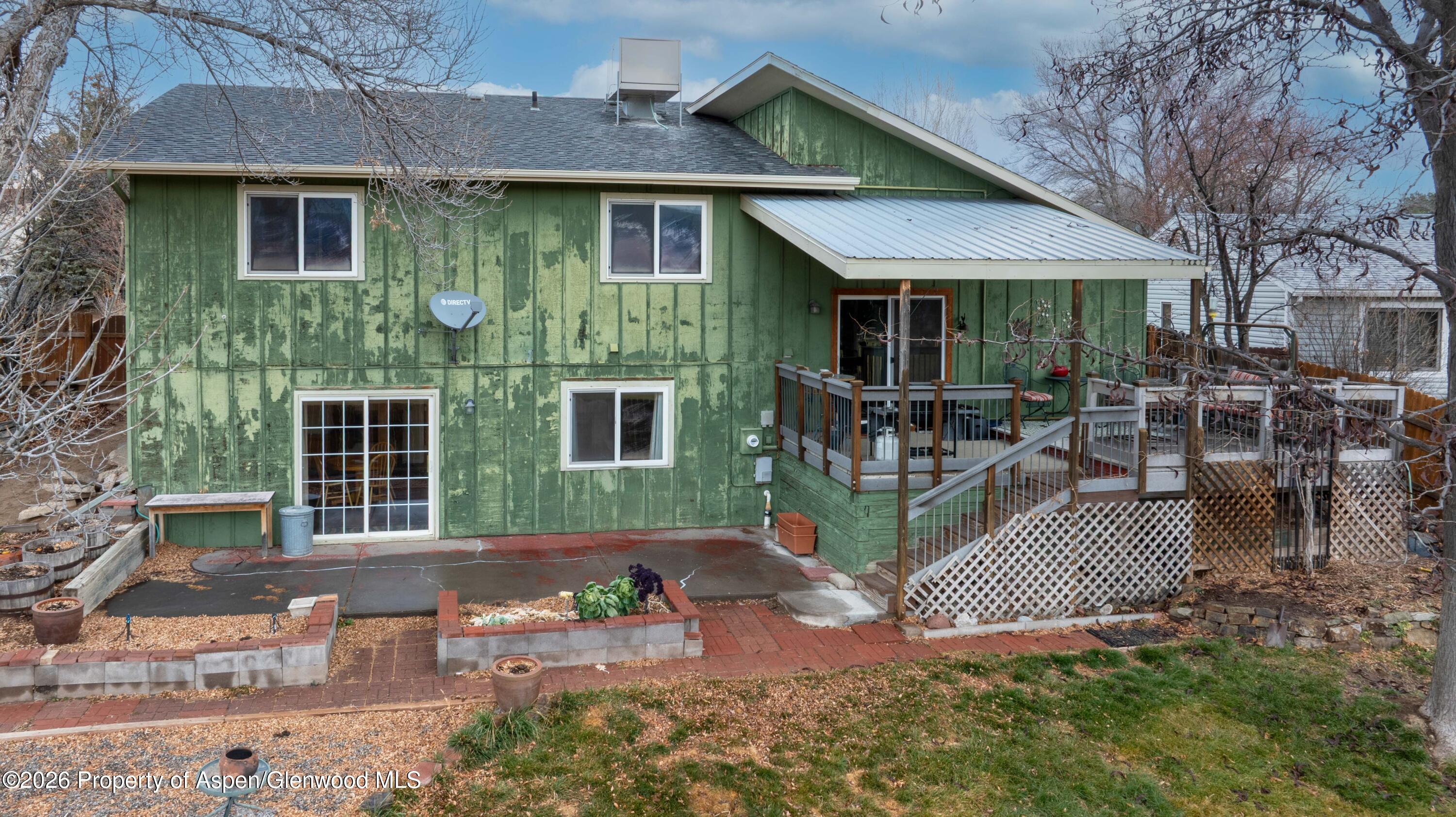 1441 Jays Avenue Rifle, CO 81650 - Photo 26 of 28 a front view of a house with garage