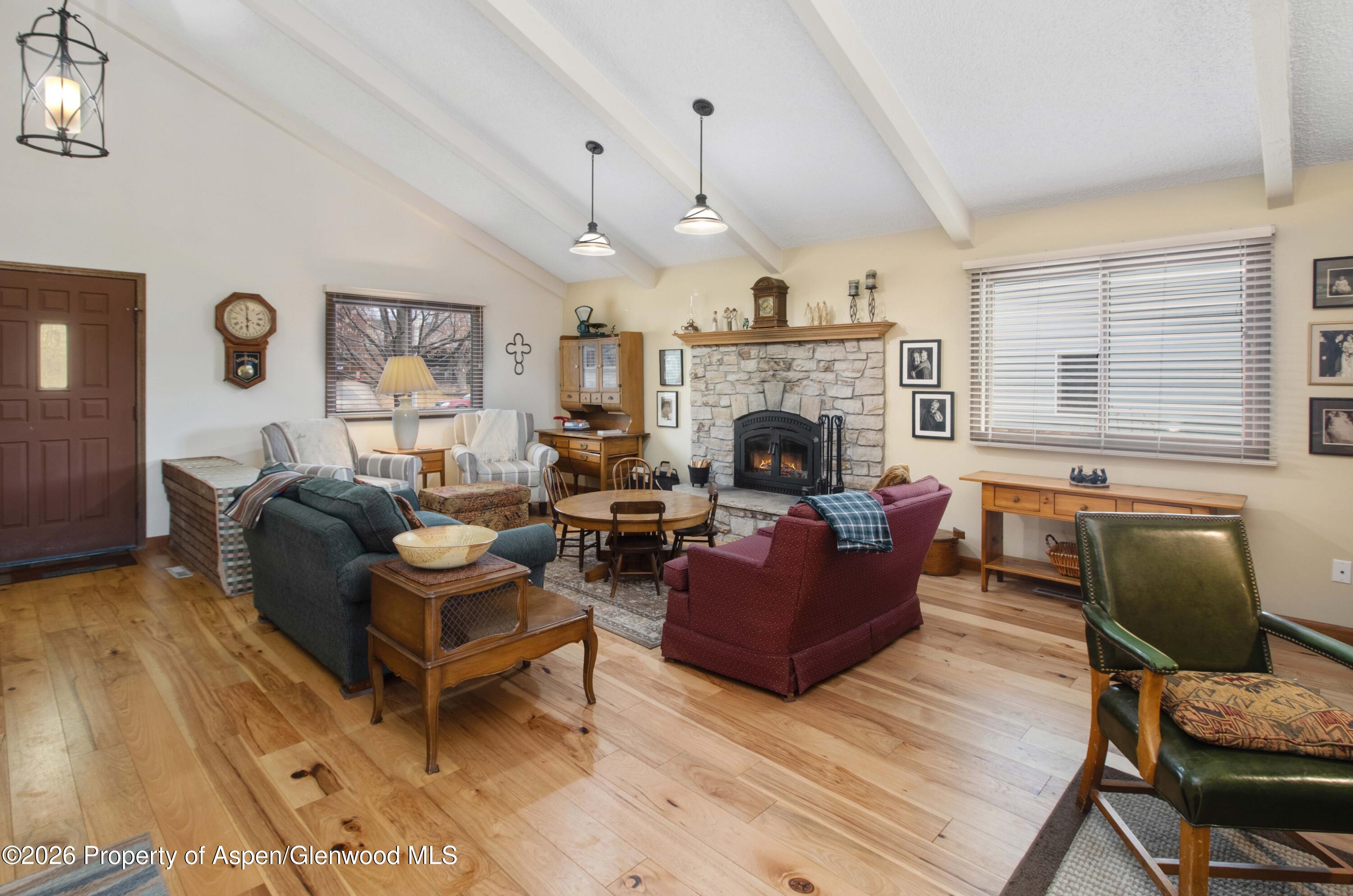 1441 Jays Avenue Rifle, CO 81650 - Photo 5 of 28 a living room with furniture and a fireplace