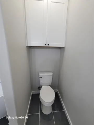 a bathroom with a toilet