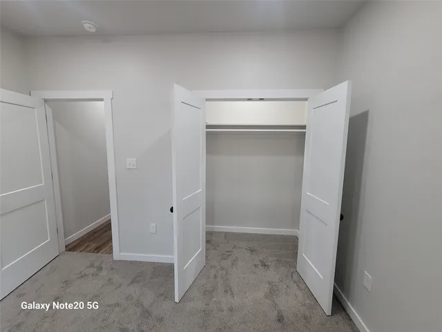 an empty room with closet