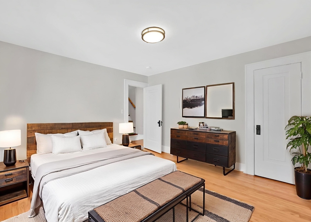 92 Grove Street West Springfield, MA 01089 - Photo 29 of 41 a bedroom with a bed and a dresser