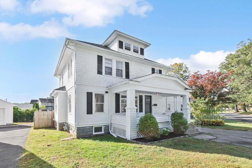 92 Grove Street West Springfield, MA 01089 - Photo 41 of 41 a front view of a house with a garden