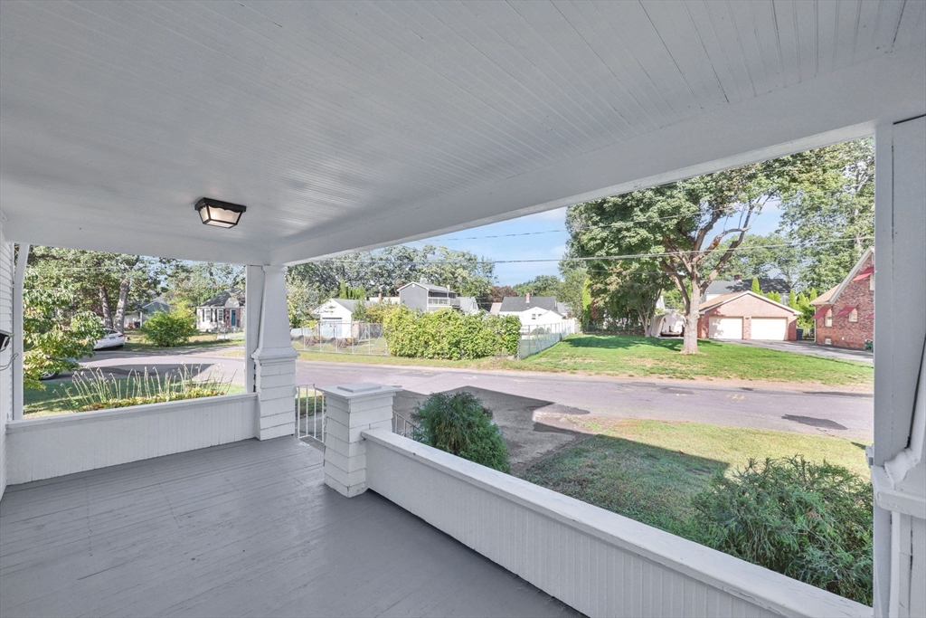92 Grove Street West Springfield, MA 01089 - Photo 5 of 41 a view of a patio with a yard