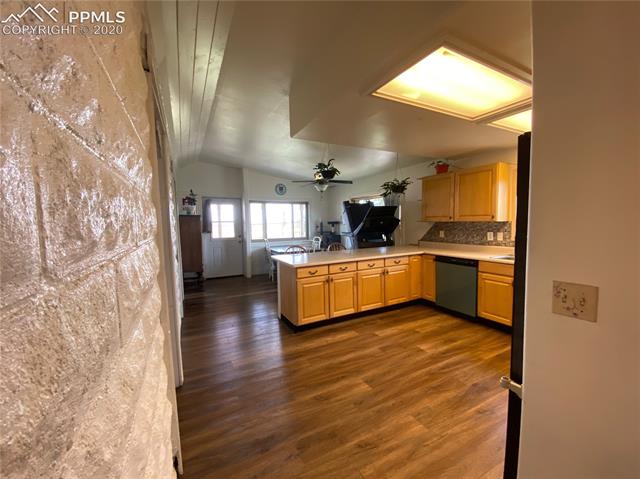 39820 Big Springs Road Rush, CO 80833 - Photo 5 of 28 Open Concept Kitchen/Dining Room Combo-Master Craft Cabinetry.