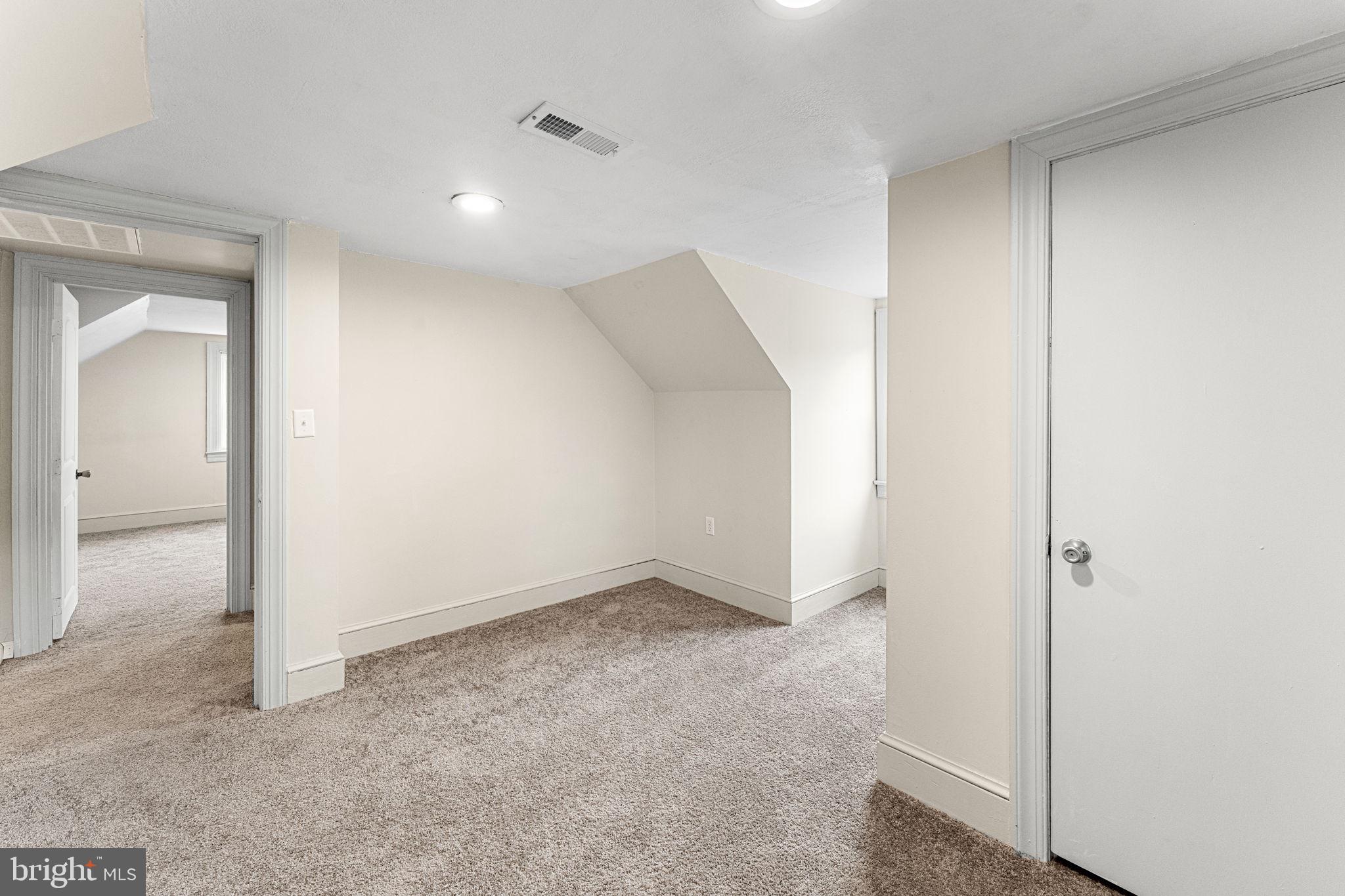 1678 Weems Road Weems, VA 22576 - Photo 21 of 30 an empty room with a natural light