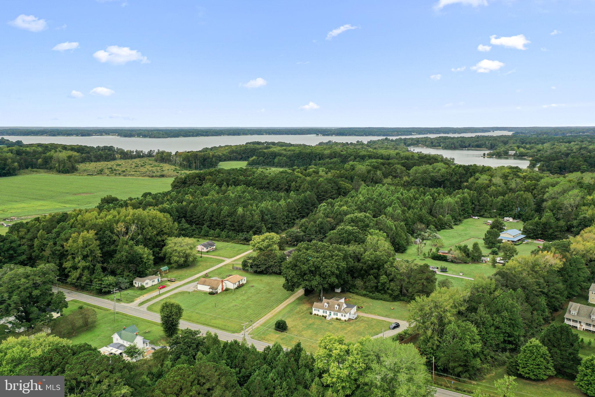 1678 Weems Road Weems, VA 22576 - Photo 26 of 30 a view of a city with lush green space