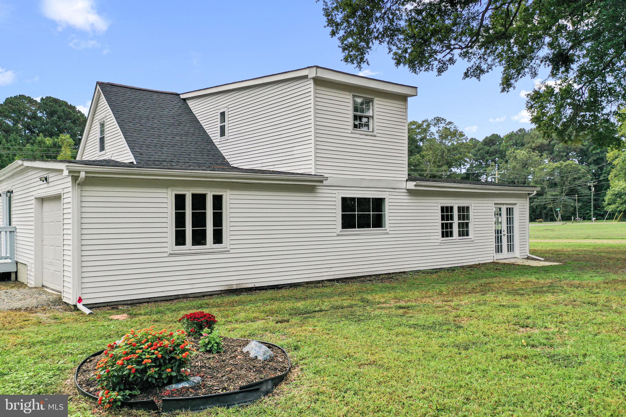 1678 Weems Road Weems, VA 22576 - Photo 29 of 30 a view of a house with a yard