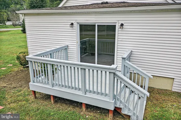 a view of a deck with a chair