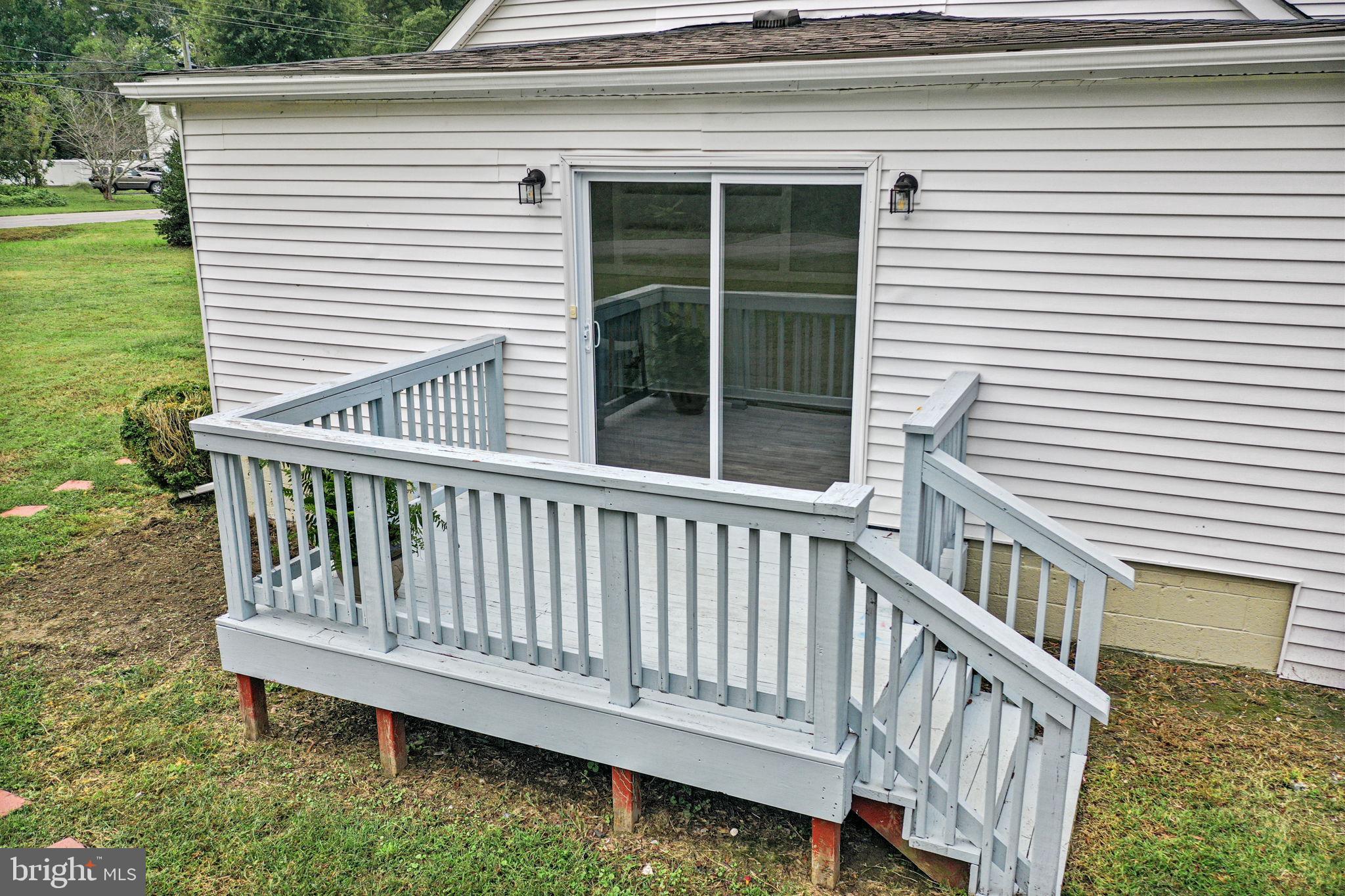 1678 Weems Road Weems, VA 22576 - Photo 30 of 30 a view of a deck with a chair