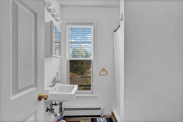 a room with a window and a table