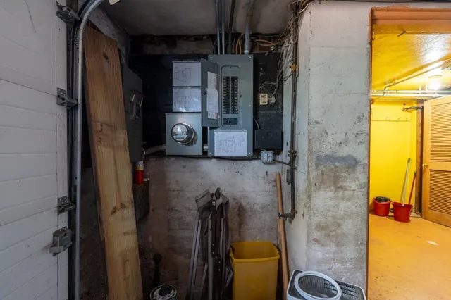 a bathroom with a granite countertop shower a mirror and a sink