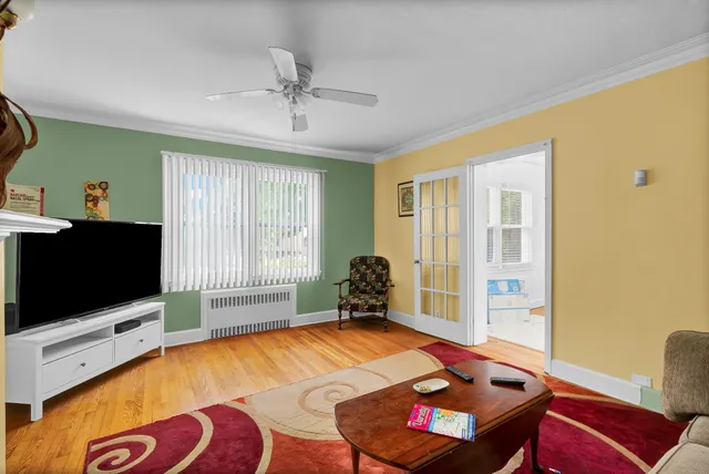 a bedroom with a bed and flat screen tv