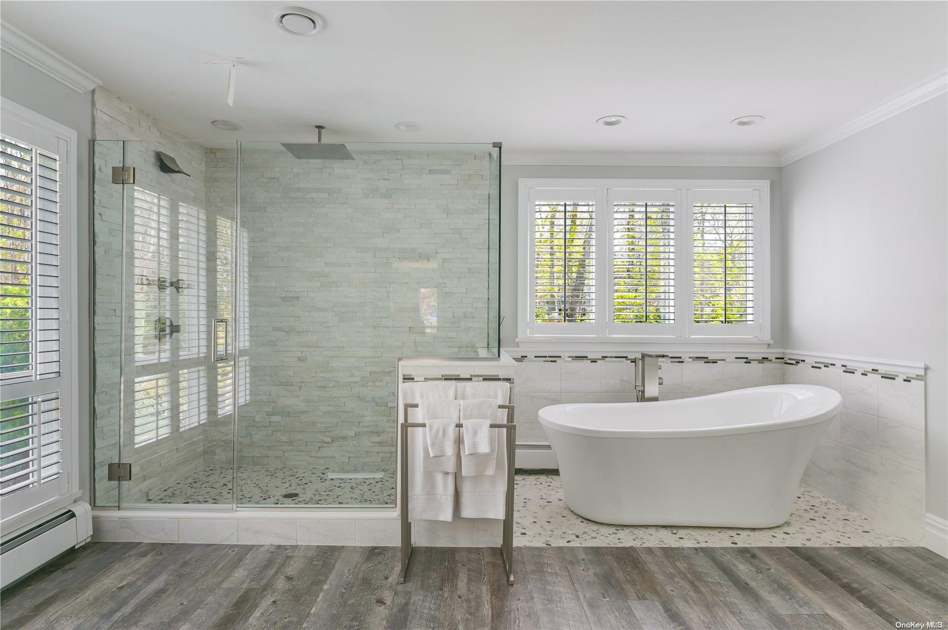355 Windjammer Drive Southold, NY 11971 - Photo 14 of 21 a spacious bathroom with a bathtub and sink