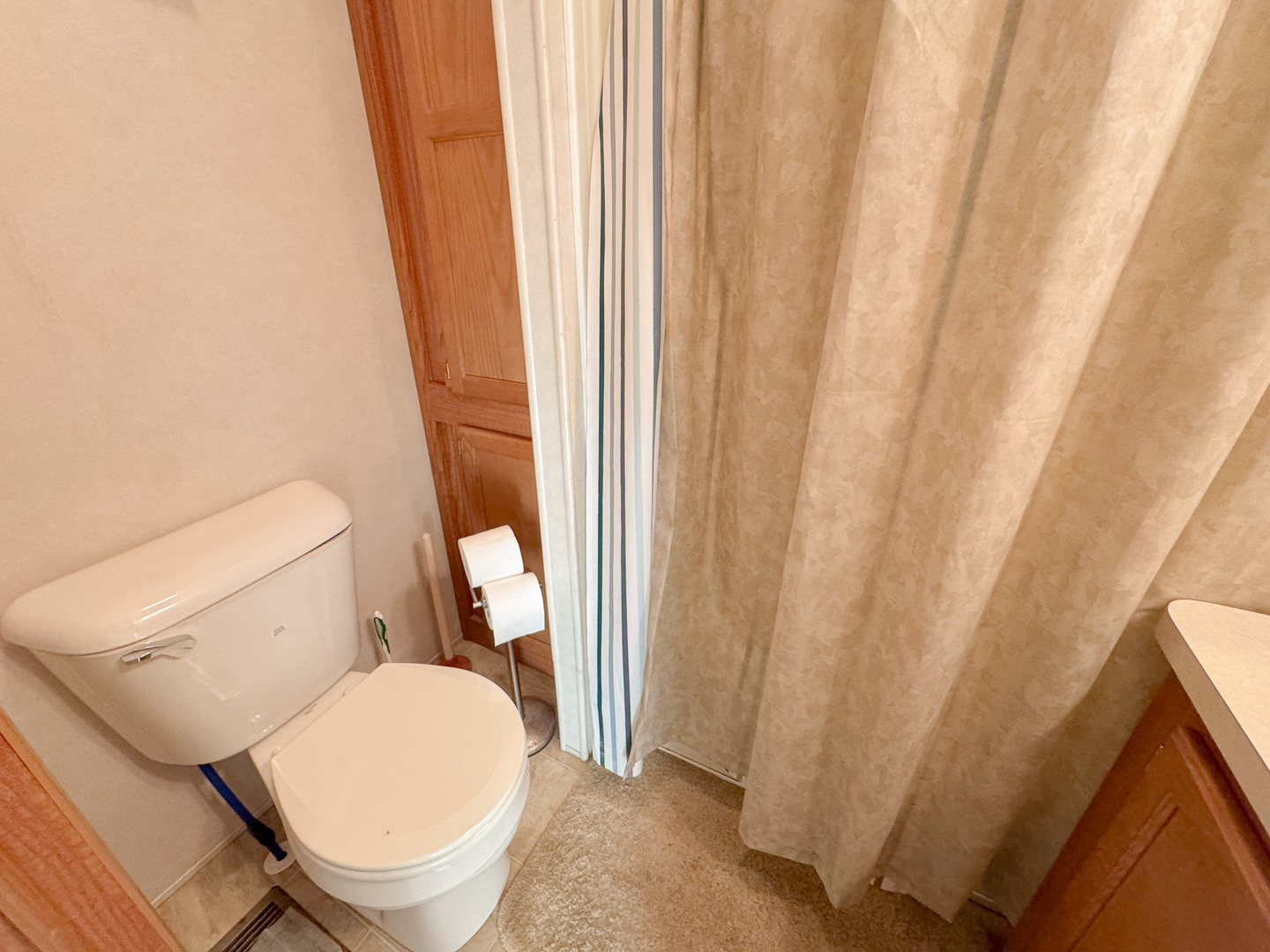 29-7 Woodhaven Sublette, IL 61367 - Photo 22 of 22 a white toilet sitting next to a small window