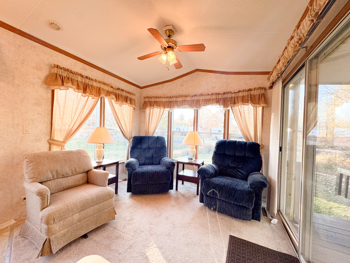 29-7 Woodhaven Sublette, IL 61367 - Photo 9 of 22 a living room with furniture and a large window