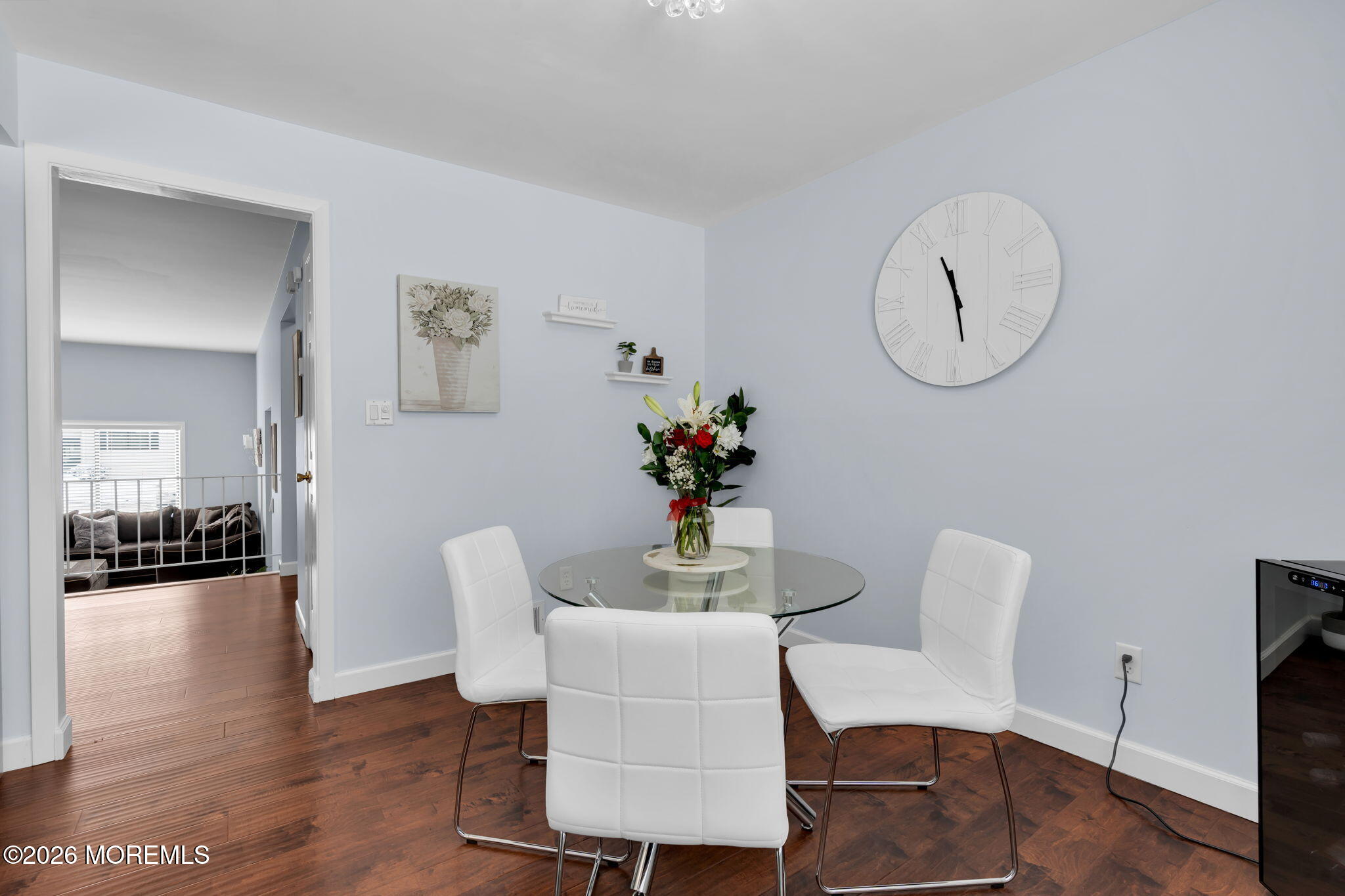 375 Middlewood Road Middletown, NJ 07748 - Photo 14 of 36 a dining room with furniture a potted plant and wooden floor