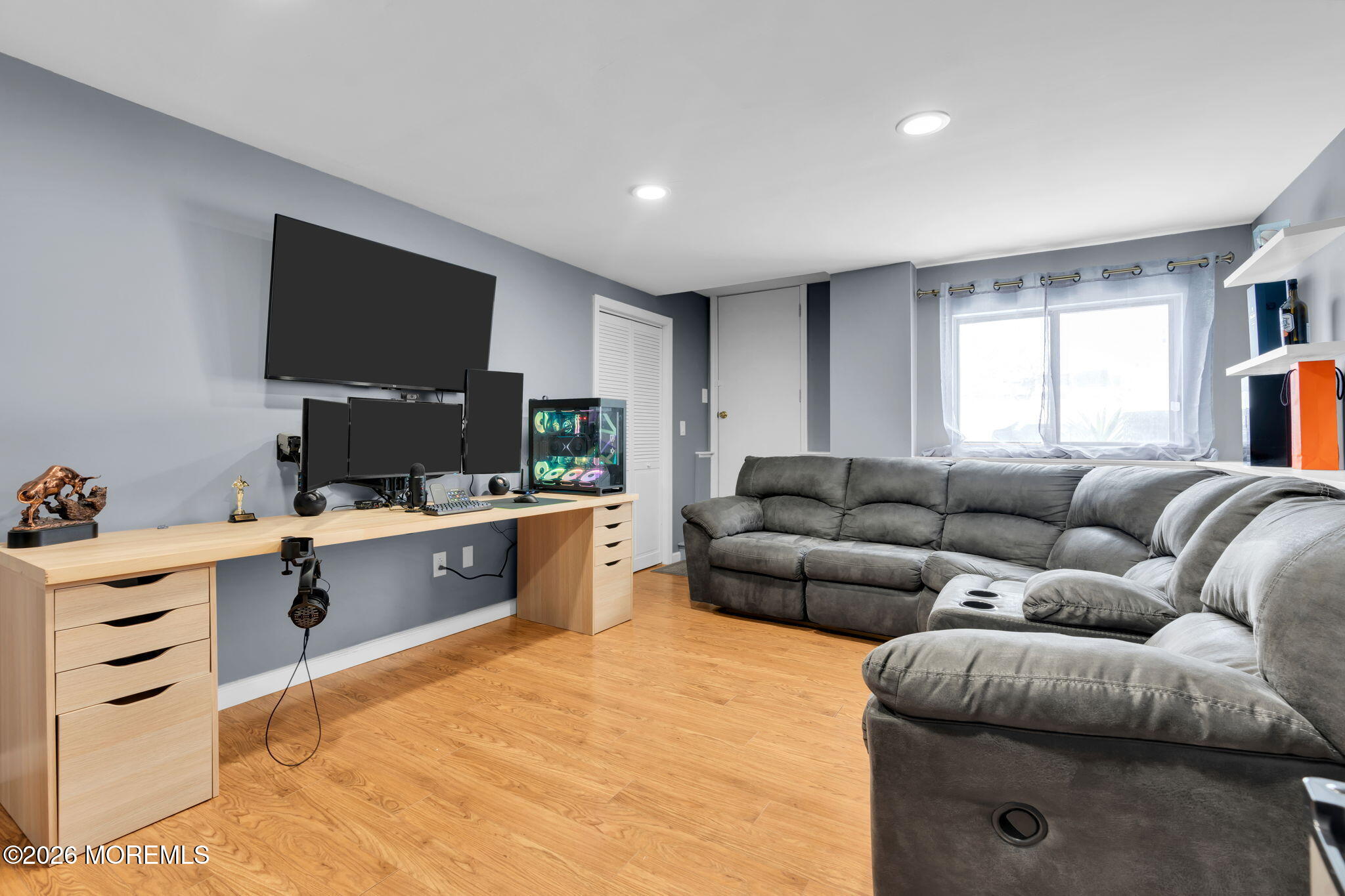 375 Middlewood Road Middletown, NJ 07748 - Photo 20 of 36 a living room with furniture a flat screen tv and kitchen view