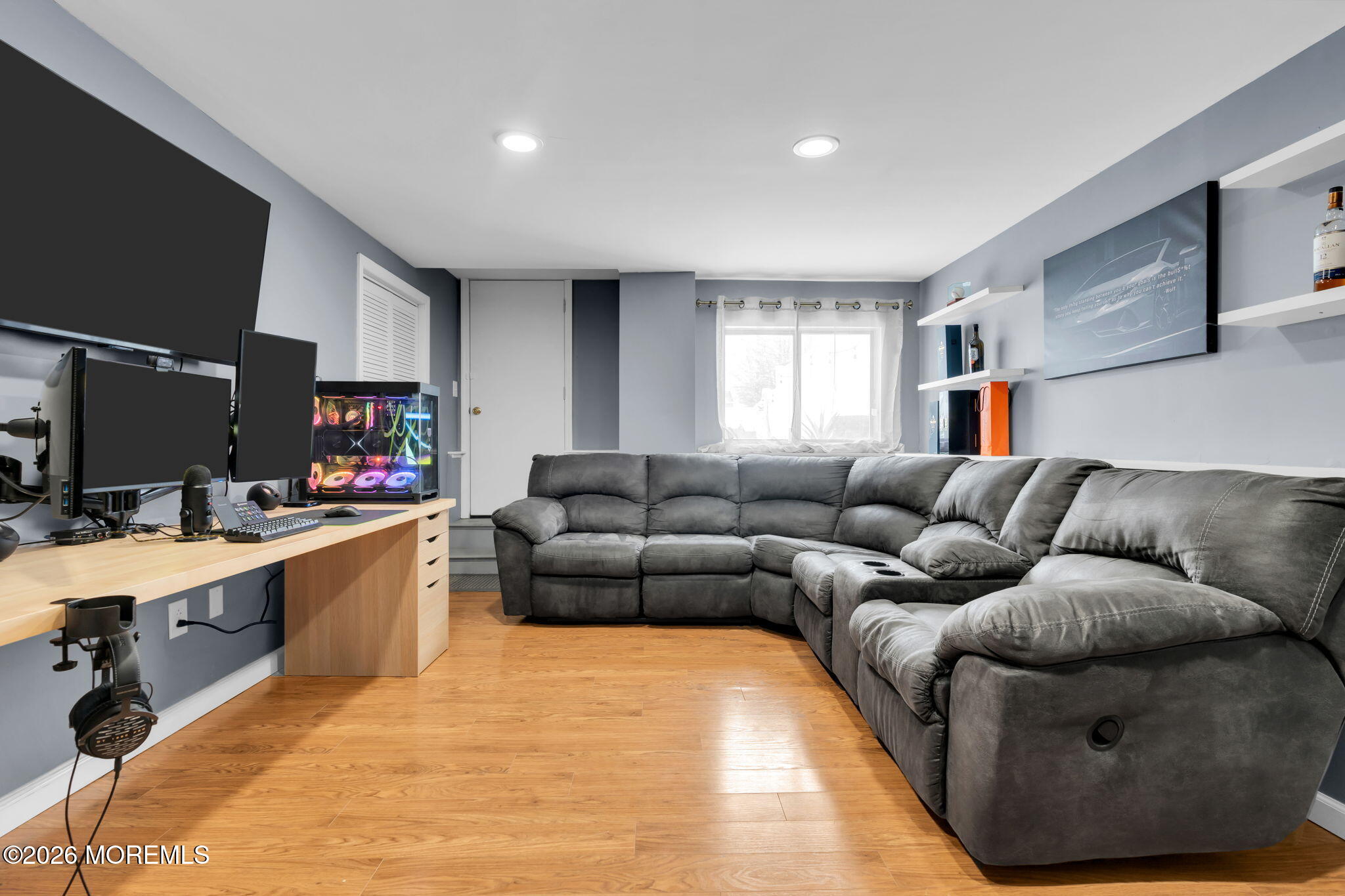 375 Middlewood Road Middletown, NJ 07748 - Photo 21 of 36 a living room with stainless steel appliances furniture a flat screen tv and a window
