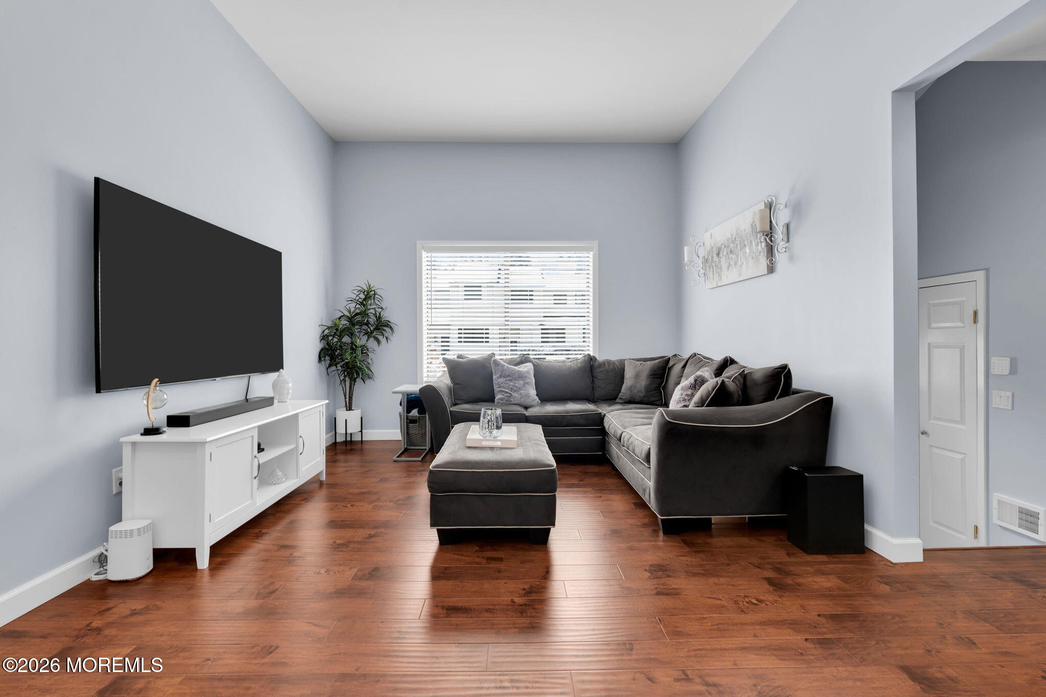 375 Middlewood Road Middletown, NJ 07748 - Photo 29 of 36 a living room with furniture and a flat screen tv