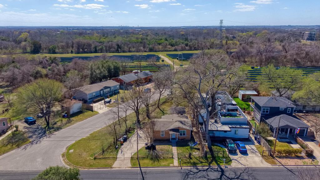 5309 Prock Lane Austin, TX 78721 - Photo 13 of 19 Aerial view of residential area featuring a forest