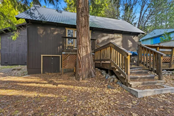 a house with trees in front of it
