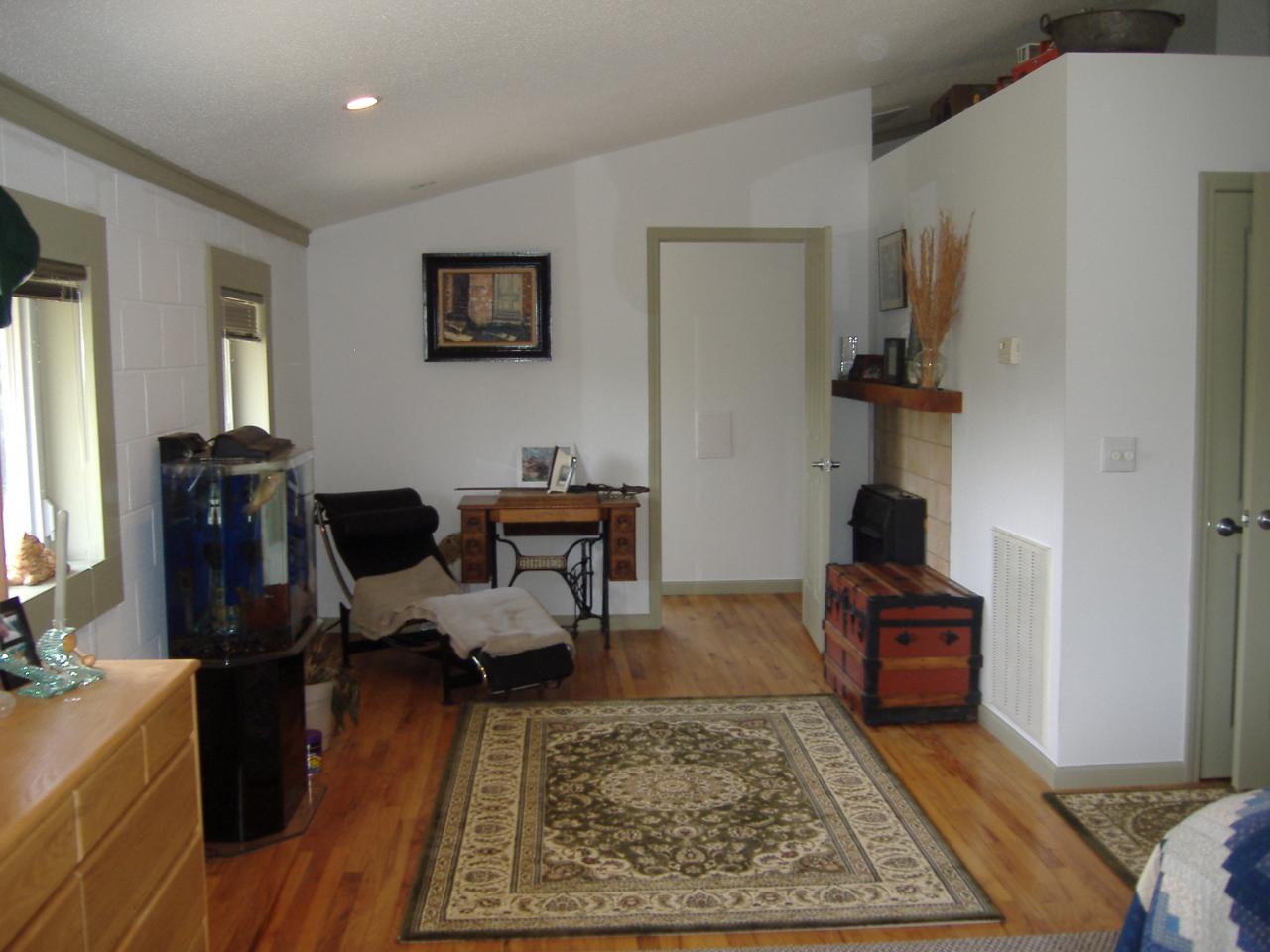 740 Dusty Rock Road Northwest Riner, VA 24149 - Photo 4 of 16 a living room with furniture and a rug