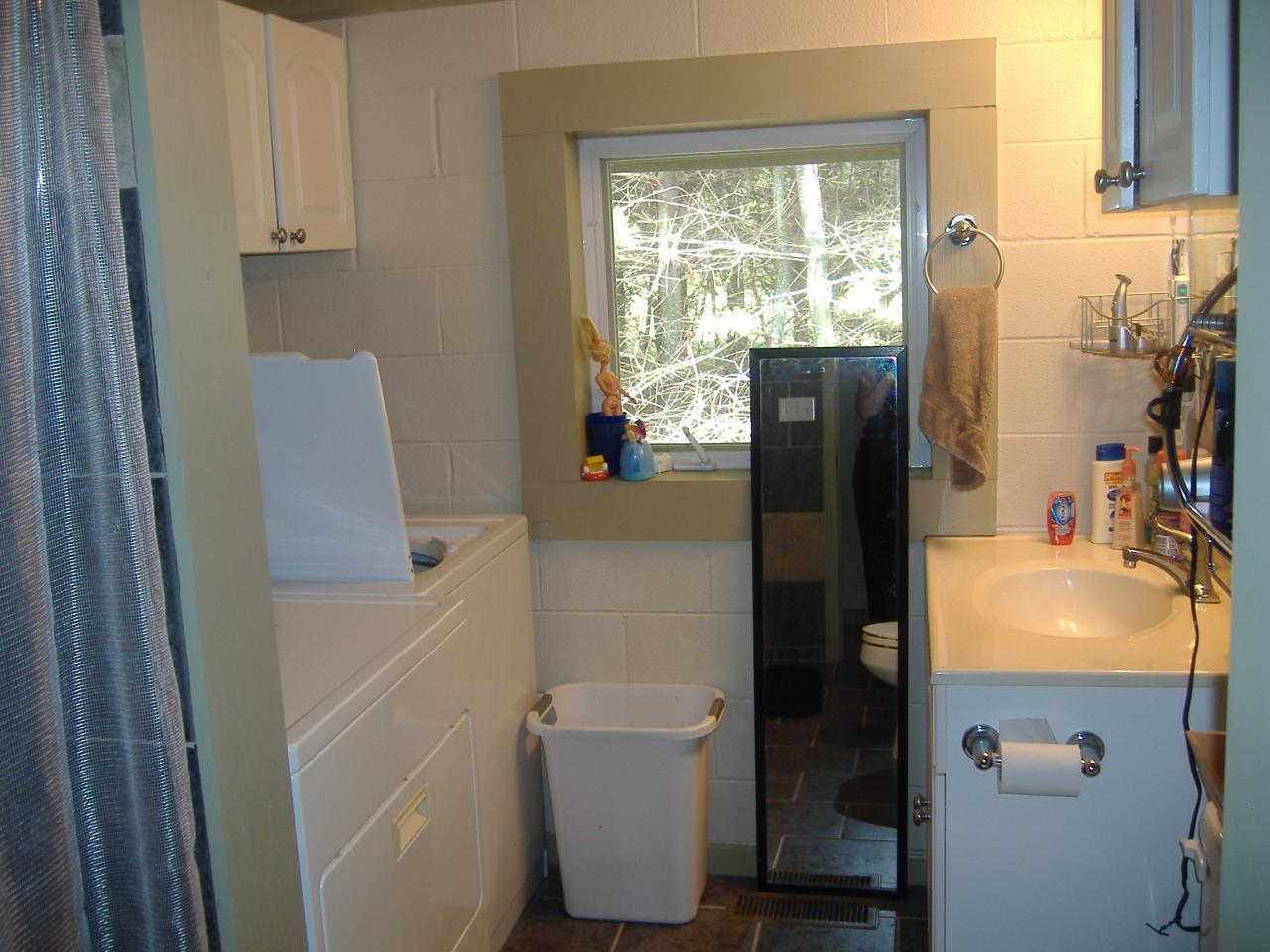 740 Dusty Rock Road Northwest Riner, VA 24149 - Photo 7 of 16 a bathroom with a sink toilet and shower