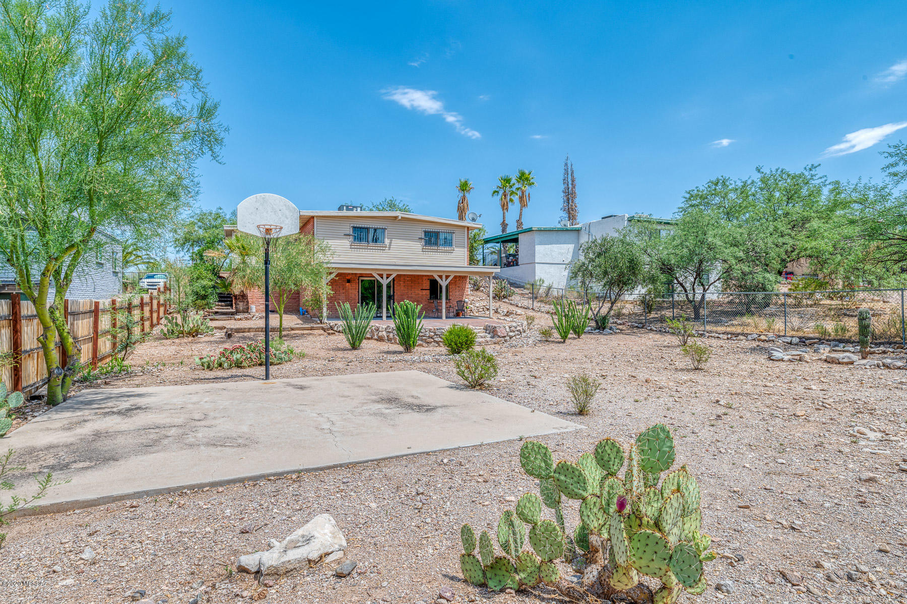 1825 North Old Ranch Road Tucson, AZ 85745 - Photo 30 of 35 a front view of a building with road