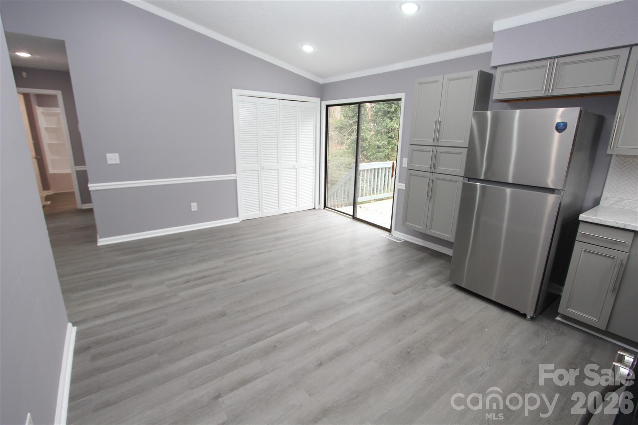48 Piper Road Wadesboro, NC 28170 - Photo 13 of 34 a view of a refrigerator in kitchen and wooden floor