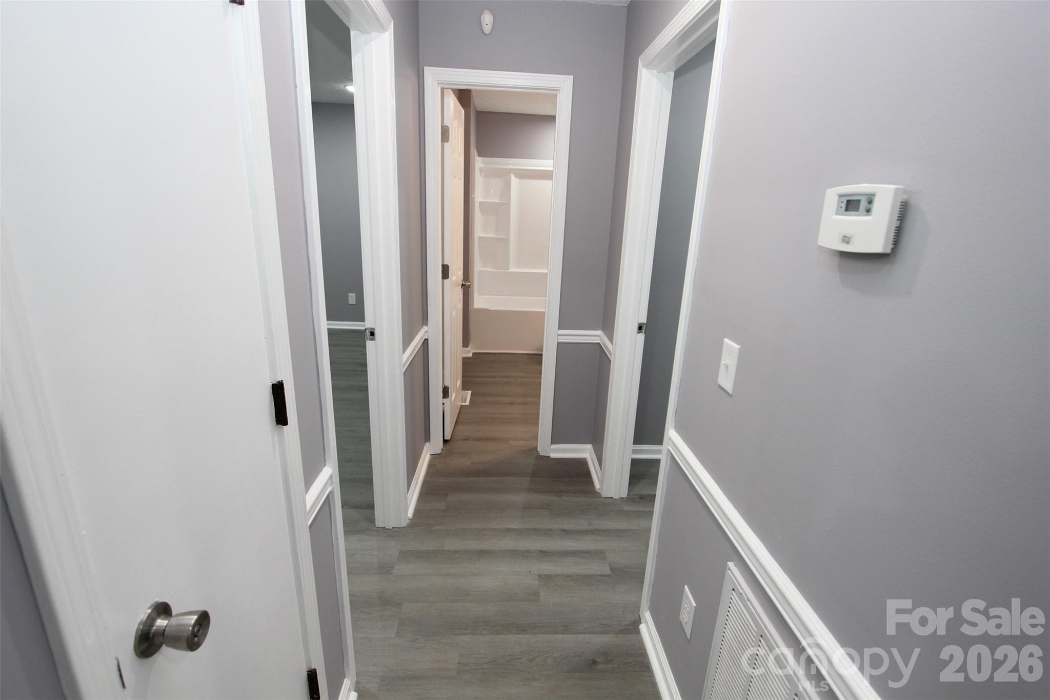48 Piper Road Wadesboro, NC 28170 - Photo 16 of 34 a view of a hallway with wooden floor and entryway