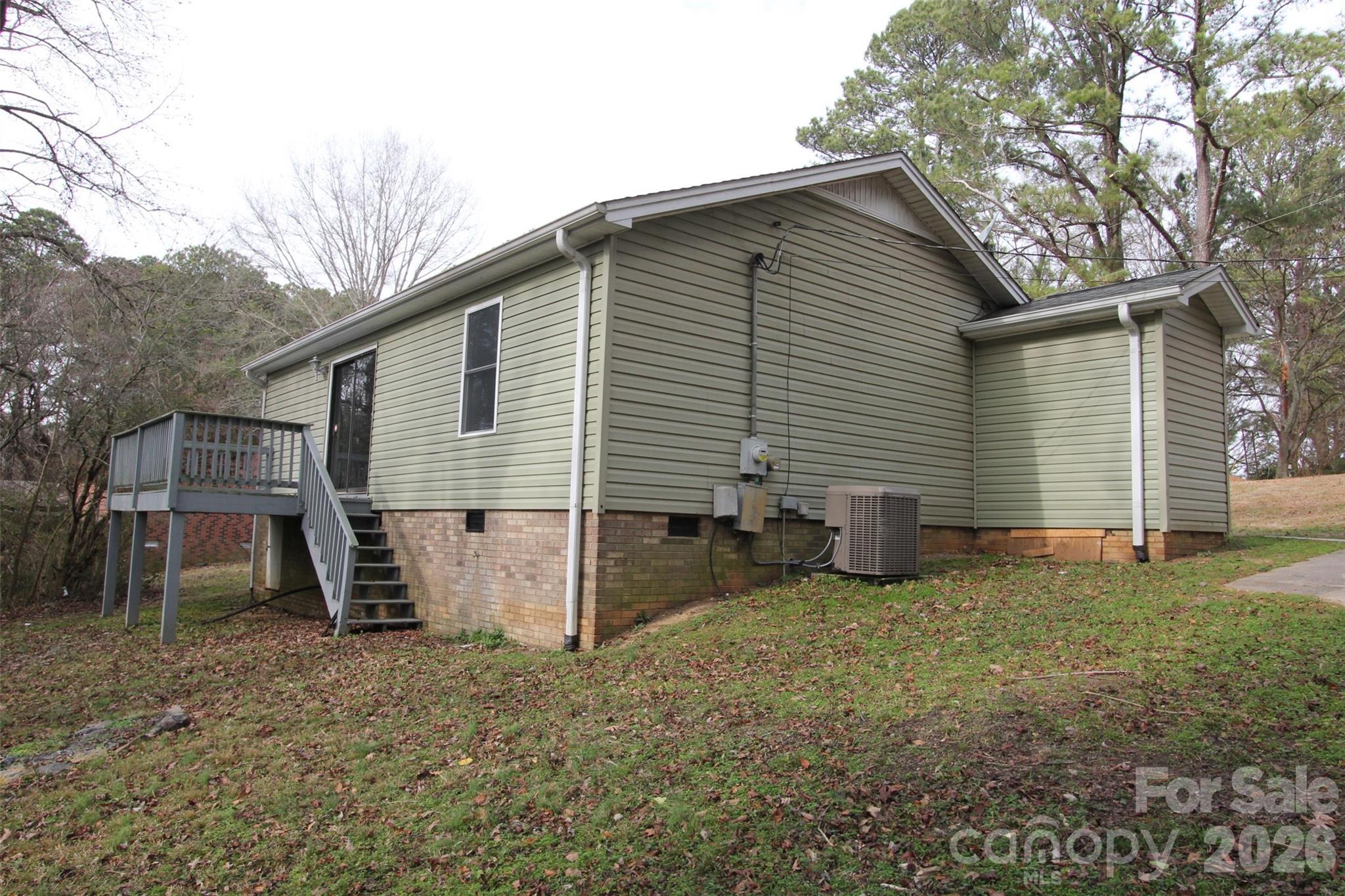 48 Piper Road Wadesboro, NC 28170 - Photo 2 of 34 a view of a house with a yard and sitting area