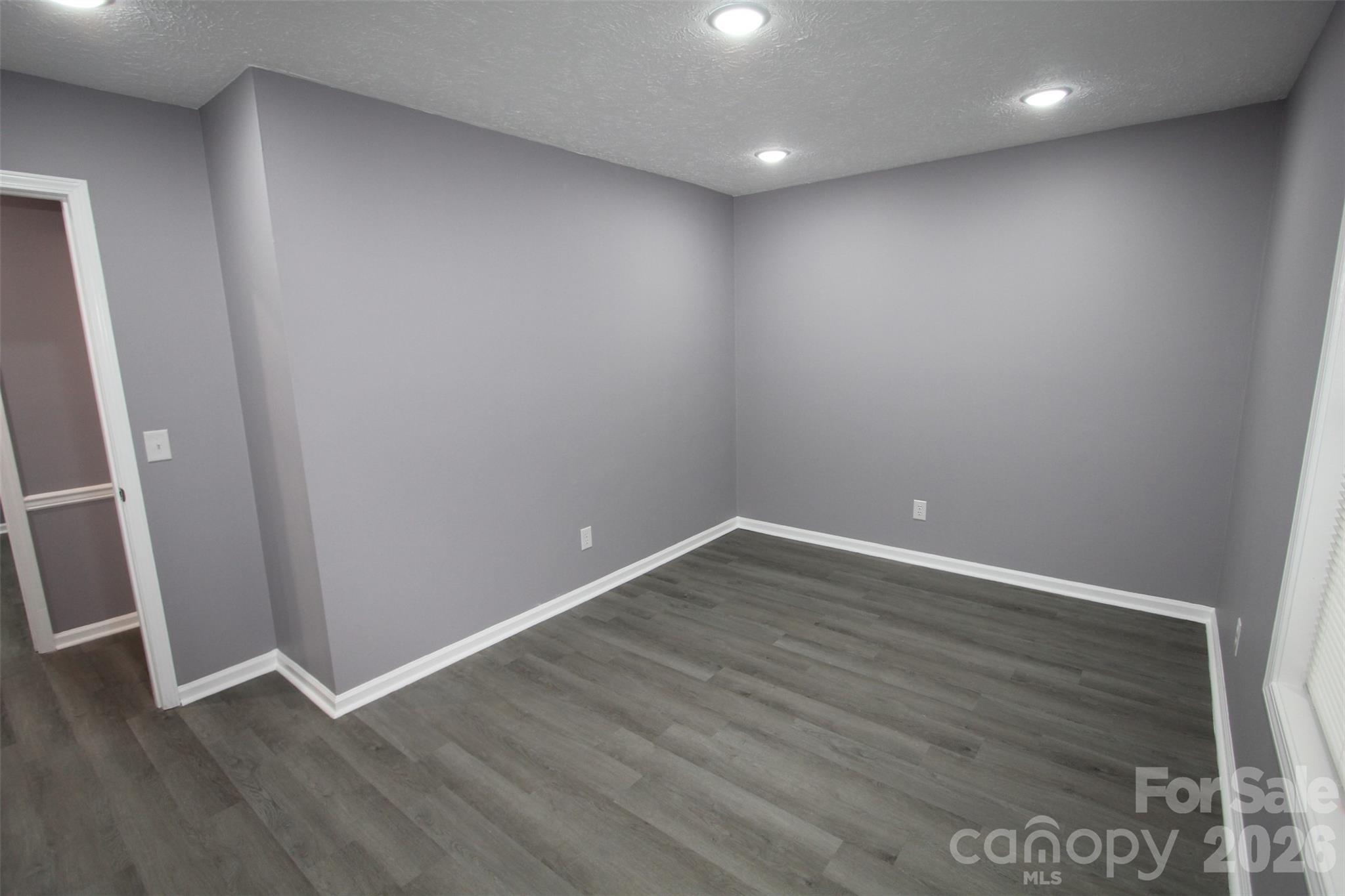 48 Piper Road Wadesboro, NC 28170 - Photo 24 of 34 an empty room with wooden floor and entrance