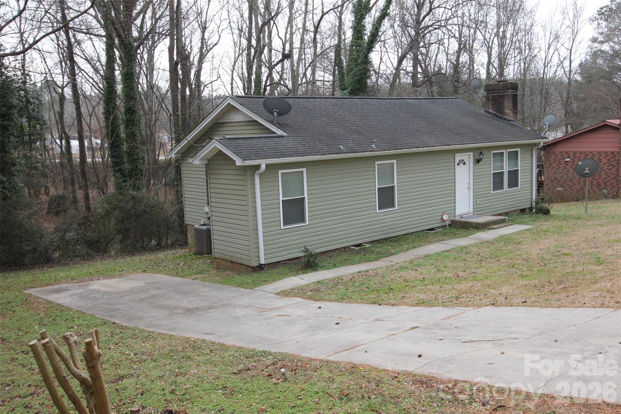 48 Piper Road Wadesboro, NC 28170 - Photo 31 of 34 a view of a house with a yard